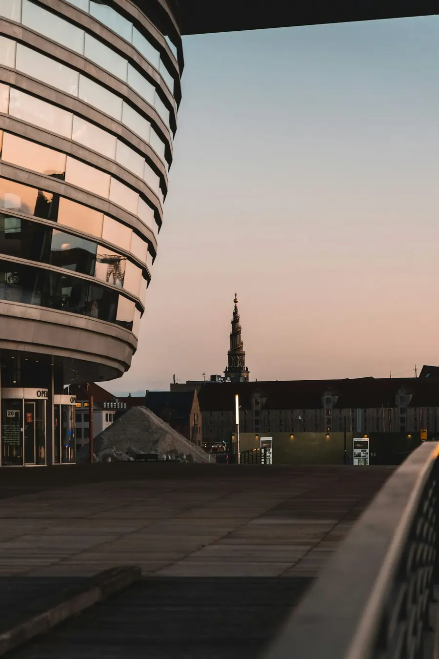 Curved Copenhagen Opera House architecture in the soft evening light